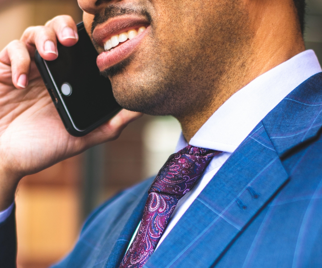 Optimized-businessman-cellphone- crop2